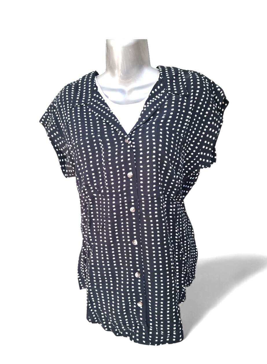 Blusa sin mangas Jachs con lunares. Diseño moderno, estampado discreto. Talla extra chica, corte favorecedor. Ligera y fácil de combinar. Minicostos RM.