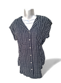 Blusa sin mangas Jachs con lunares. Diseño moderno, estampado discreto. Talla extra chica, corte favorecedor. Ligera y fácil de combinar. Minicostos RM.