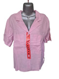 Blusa Buffalo de lino natural. Diseño camisero con cuello de solapa y bolsillos frontales. Transpirable y ligera. Estilo casual premium. Minicostos RM.
