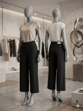 Pantalón culotte ejecutivo CC&CO con cintura de control. Pierna ancha, talle alto, panel tummy-control. Tejido de sarga, negro o geométrico. Minicostos RM.