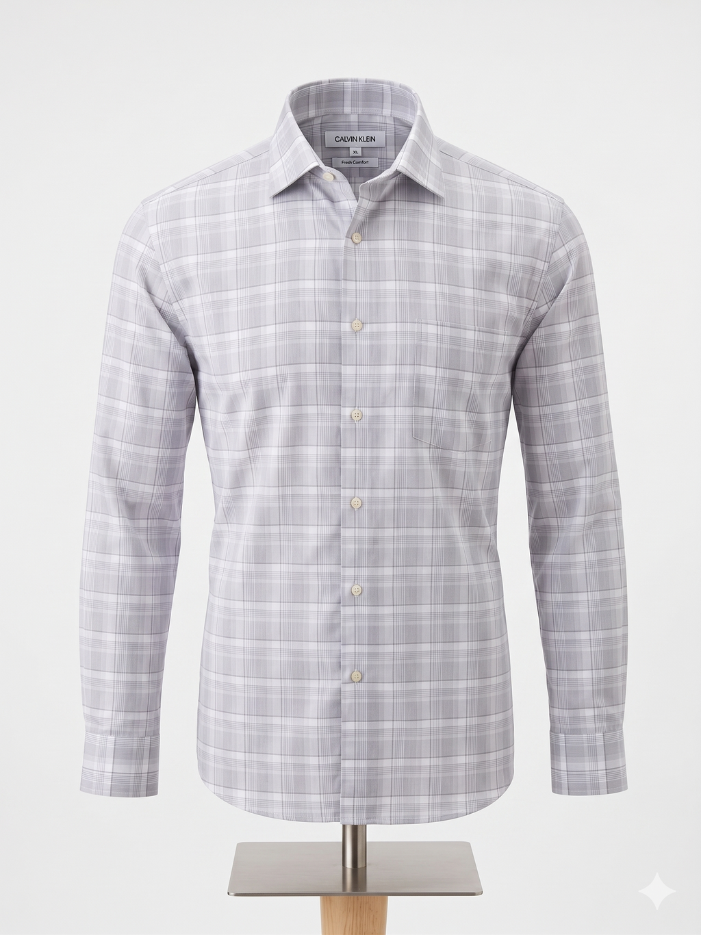 Camisa Calvin Klein Fresh Comfort talla XL. Patrón de cuadros en grises y blanco, corte regular fit. Tecnología transpirable, frescura todo el día. Minicostos RM.