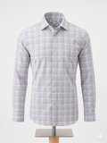 Camisa Calvin Klein Fresh Comfort talla XL. Patrón de cuadros en grises y blanco, corte regular fit. Tecnología transpirable, frescura todo el día. Minicostos RM.