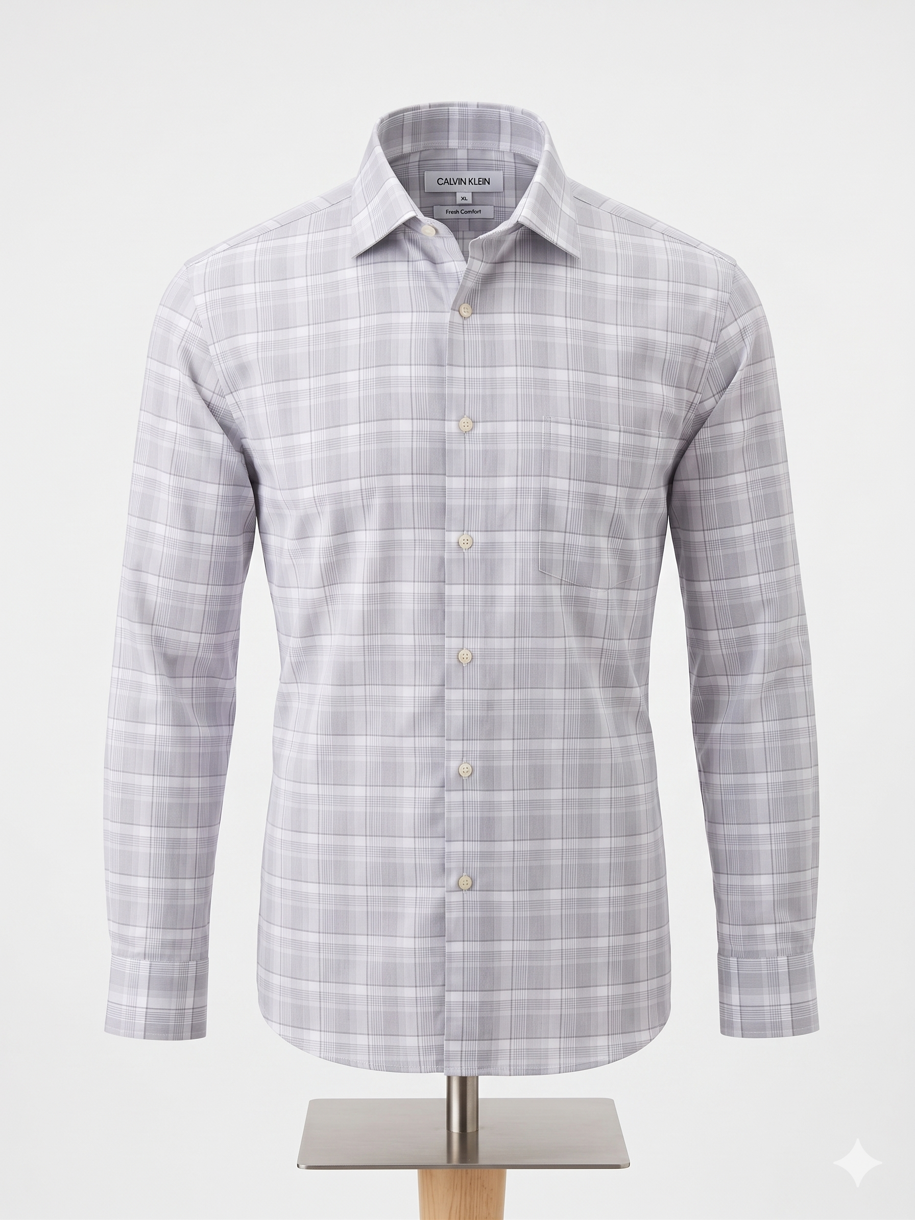Camisa Calvin Klein Fresh Comfort talla XL. Patrón de cuadros en grises y blanco, corte regular fit. Tecnología transpirable, frescura todo el día. Minicostos RM.