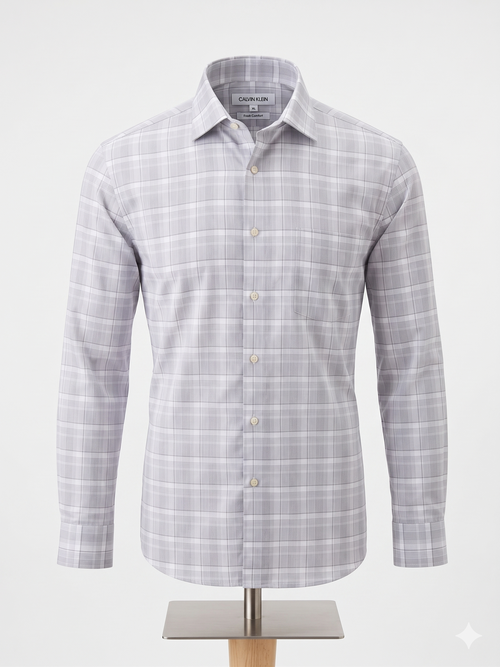 Camisa Calvin Klein Fresh Comfort talla XL. Patrón de cuadros en grises y blanco, corte regular fit. Tecnología transpirable, frescura todo el día. Minicostos RM.
